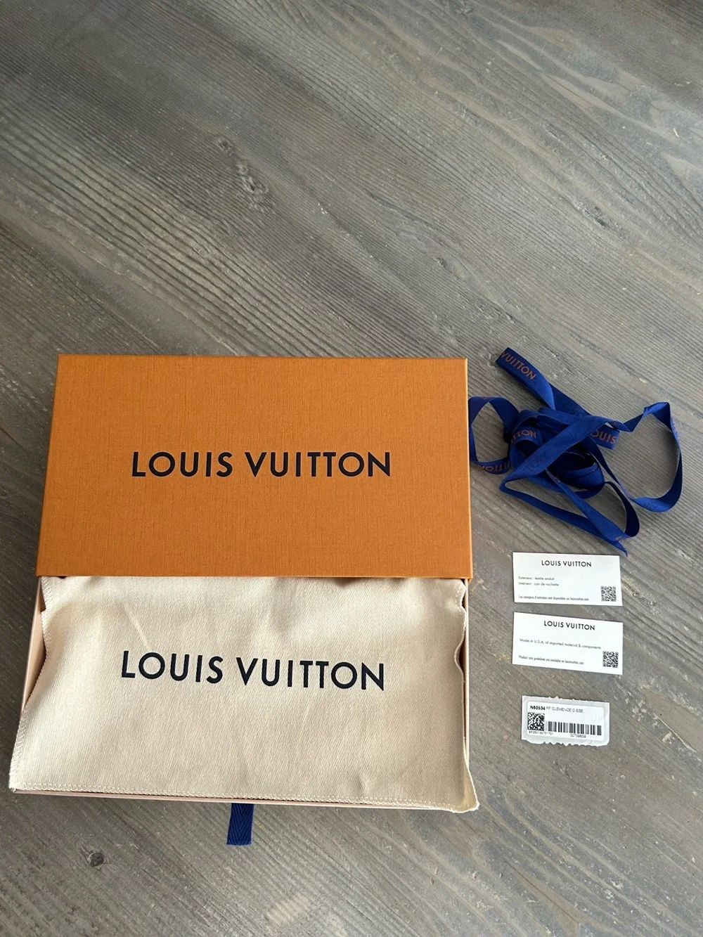 Authentic Louis Vuitton Damier Ebene Zip-Around Wallet with Red Leather Pull